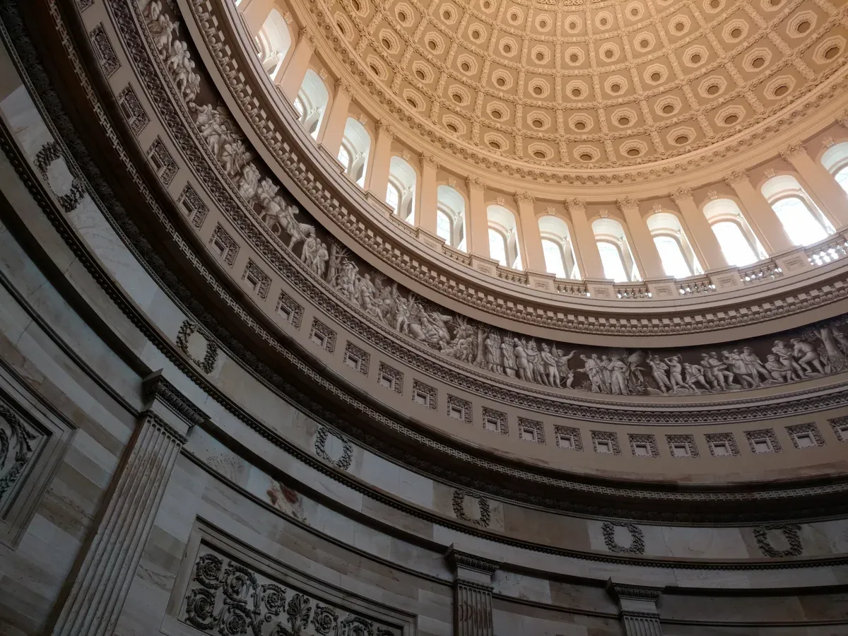 The painted dome of the US Capitol Rotunda seen from the floor, the high point of the Capitol stop on Washington DC tours for seniors